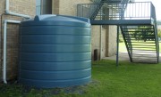 10000 litre rainwater tank near house